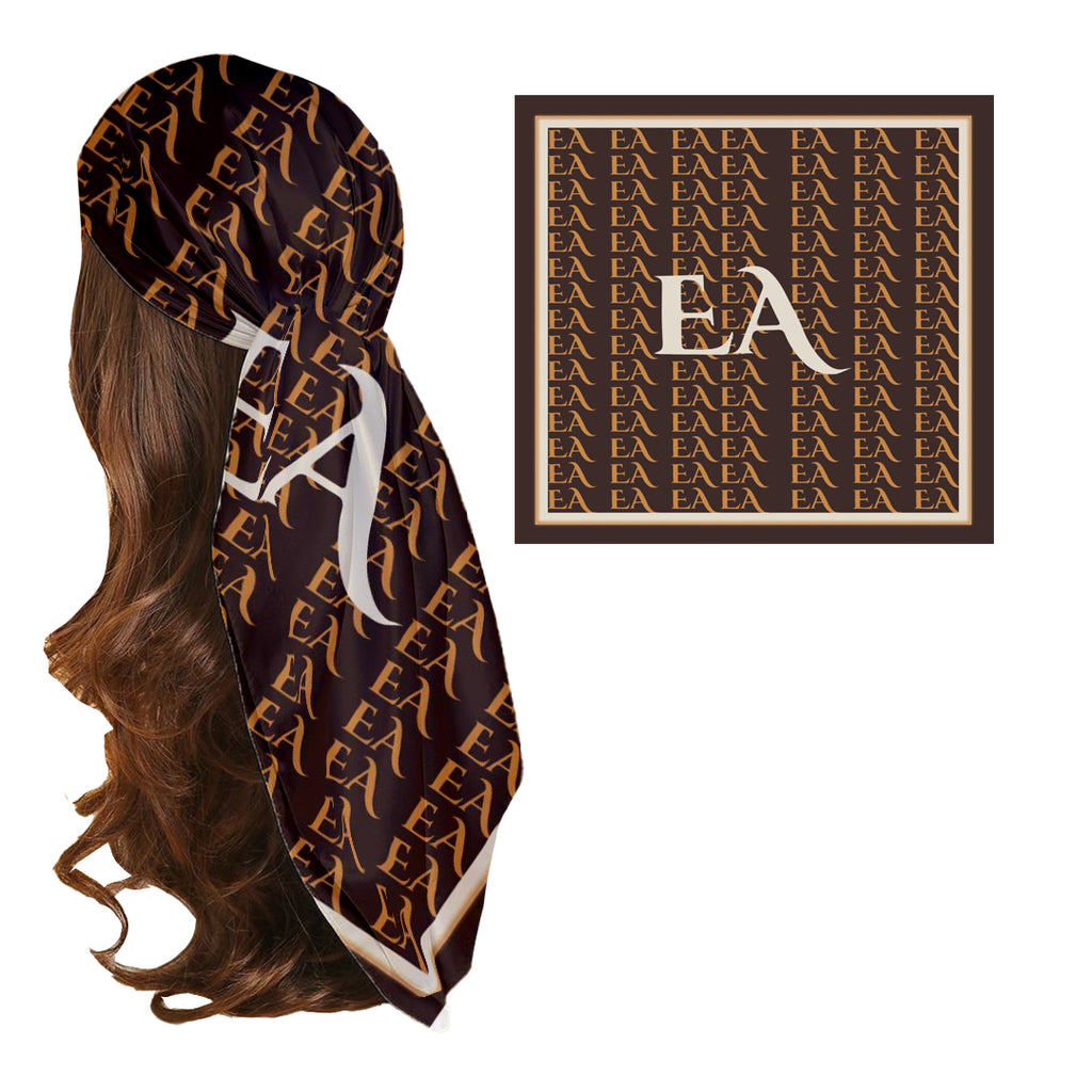 A head scarf with a brown and nude color palette, featuring the monogram 'EA' repeated pattern.