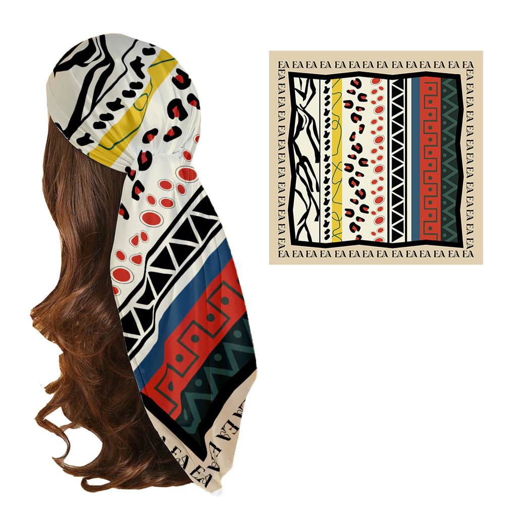 A multicolored silk head scarf with geometric and floral patterns, displayed on a mannequin with a close-up inset showing the detailed design.
